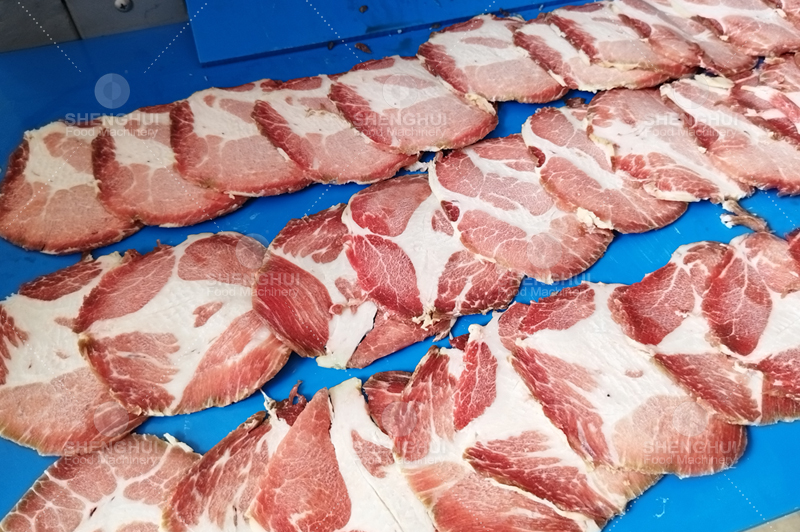 Machine de d&eacute;coupe de rouleaux de viande congel&eacute;s